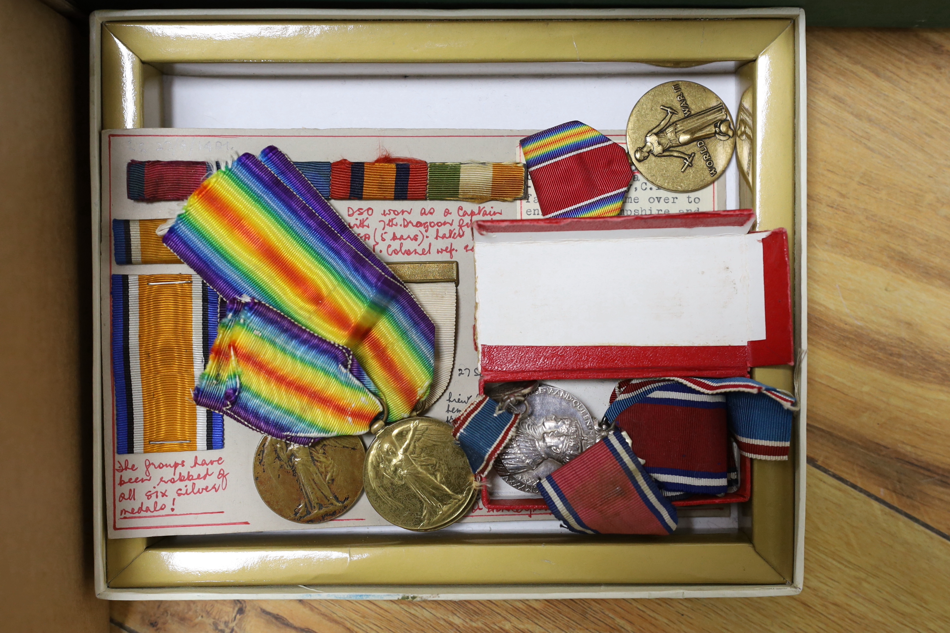 A collection of mainly British medals, awards and associated items including; six coronation medals for ERII, GRVI and GRV, three Victory Medals and a 1914-15 Star, a good selection of WWI and later miniatures including